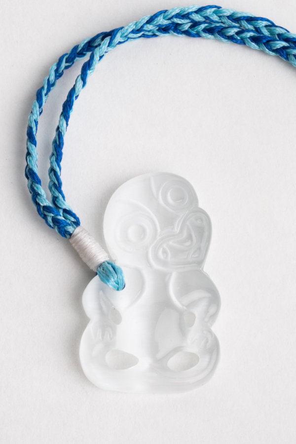 Hei Tiki, White beryl on two tone blue cord